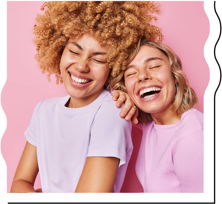 Two women laughing set on a pink background