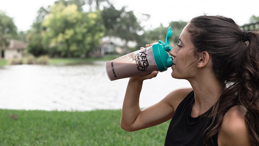 A woman drinking Keto Chow