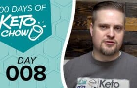Keto Chow graphic with 100 DAYS OF KETO CHOW DAY 008, white shaker logo, teal hexagonal background. Man in grey Keto Chow shirt.
