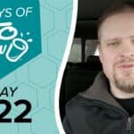 Image displaying a man on the right and a graphic on the left. The graphic, in teal and light blue, features the text 100 DAYS OF KETO CHOW and DAY 022. The Keto Chow brand logo includes a white shaker cup icon.
