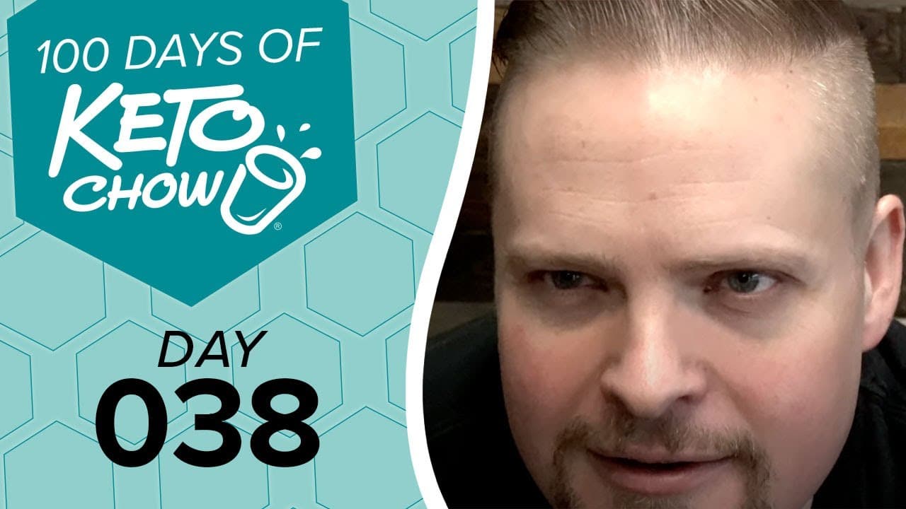 KETO CHOW: 100 DAYS OF KETO CHOW, DAY 038. Cup logo, teal hexagonal background. Man's face on right.