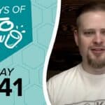 Teal graphic features white text 100 DAYS OF KETO CHOW, Keto Chow logo splash design, and black text DAY 041. A man with a goatee smiles on the right.