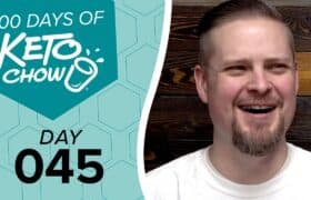 KETO CHOW graphic 100 DAYS OF KETO CHOW, DAY 045, with cup and splash logo on teal hexagon background. A smiling man is on the right.