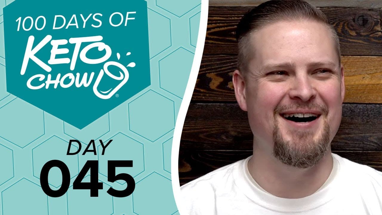 KETO CHOW graphic 100 DAYS OF KETO CHOW, DAY 045, with cup and splash logo on teal hexagon background. A smiling man is on the right.