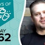 Teal graphic with 100 DAYS OF KETO CHOW logo and text DAY 062. A man in a black shirt is on the right with a wooden background.