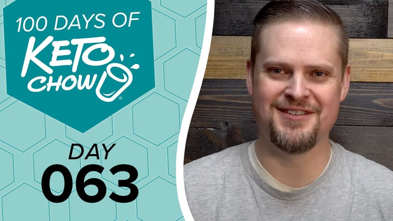 Digital graphic for KETO CHOW with a teal honeycomb background. Text reads 100 DAYS OF KETO CHOW and DAY 063. A man with a beard smiles on the right.