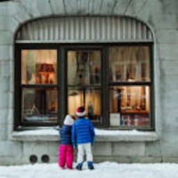 kids looking through window