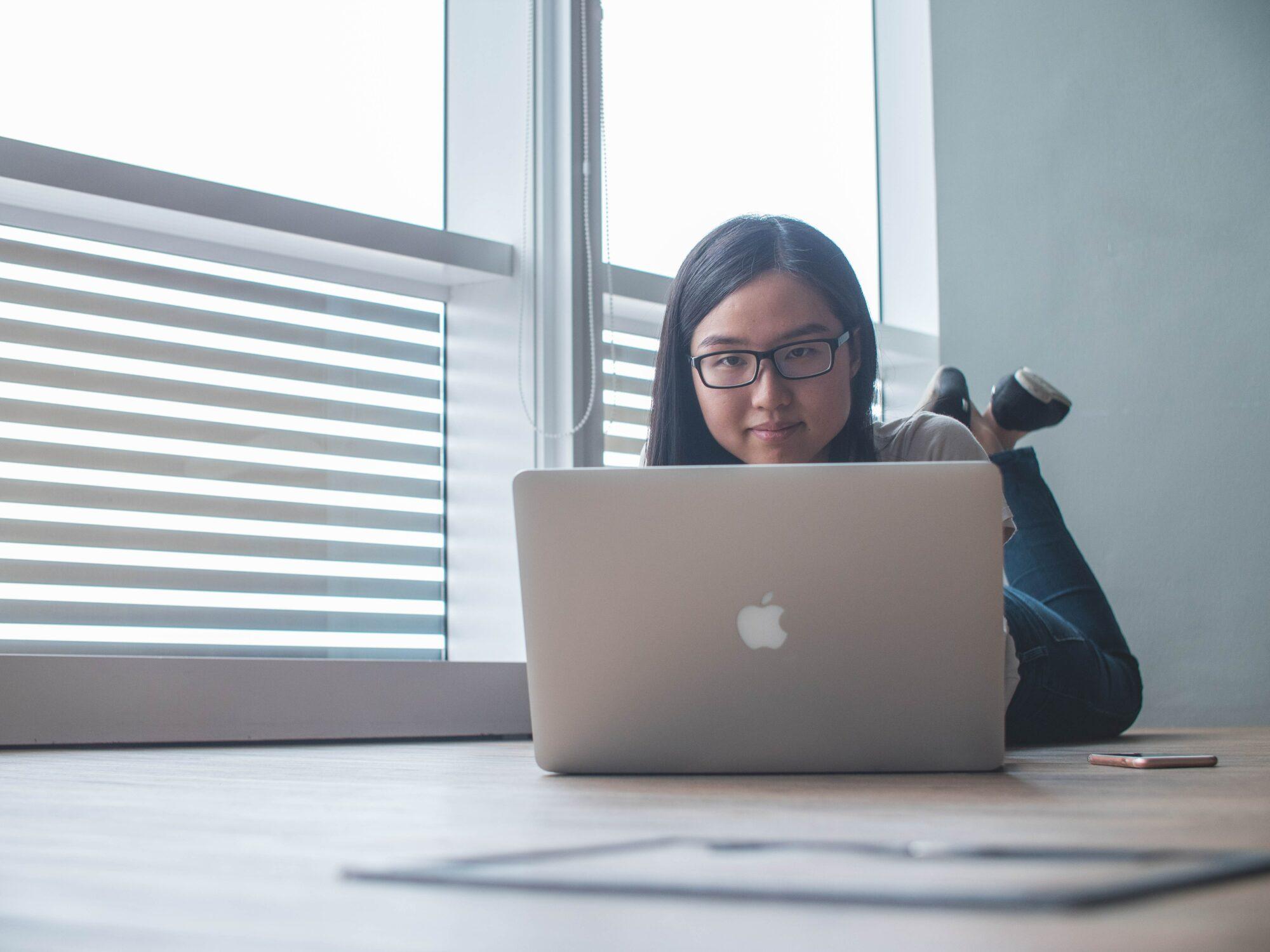 woman looking at computer