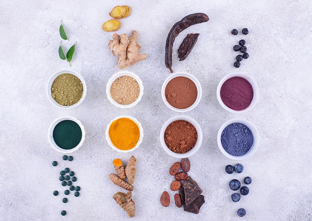 table of different spices ground into powders