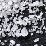 grains of salt on a black background