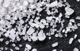 grains of salt on a black background