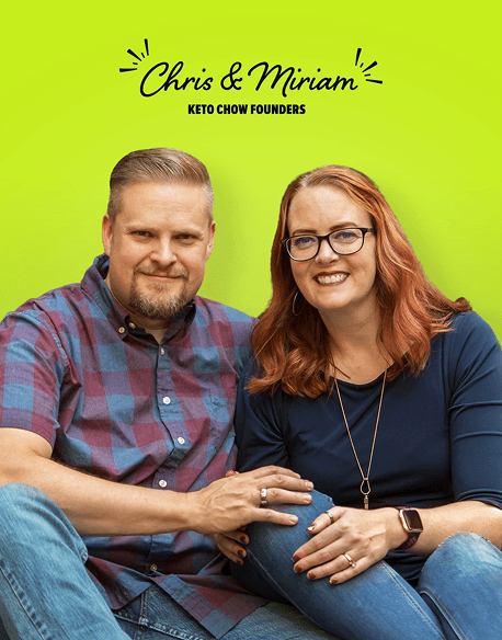 Chris & Miriam, Keto Chow Founders, pose on a green background.