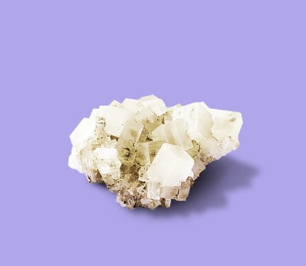 A salt crystal on a purple background