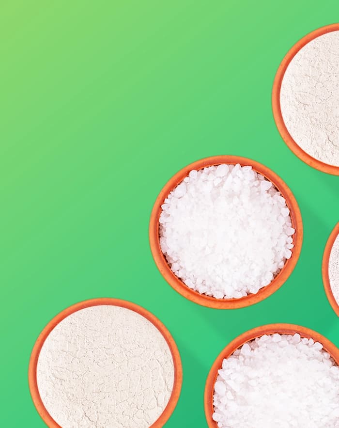 Overhead view of bowls of white granular material