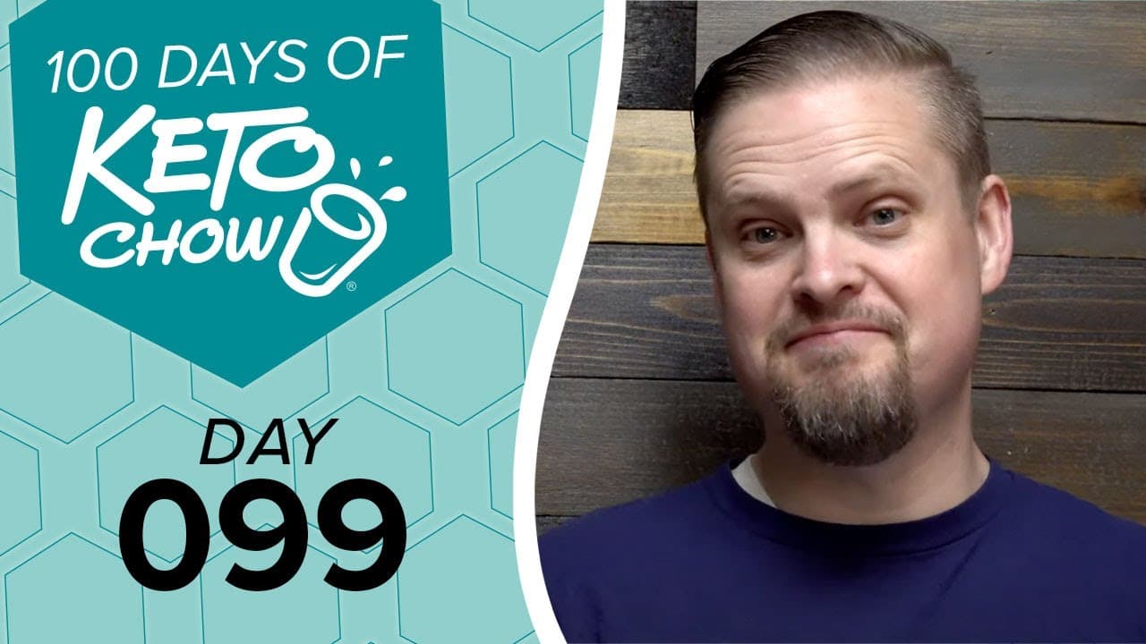 Teal and white Keto Chow 100 Days graphic with DAY 099. Man in blue shirt against wood background.