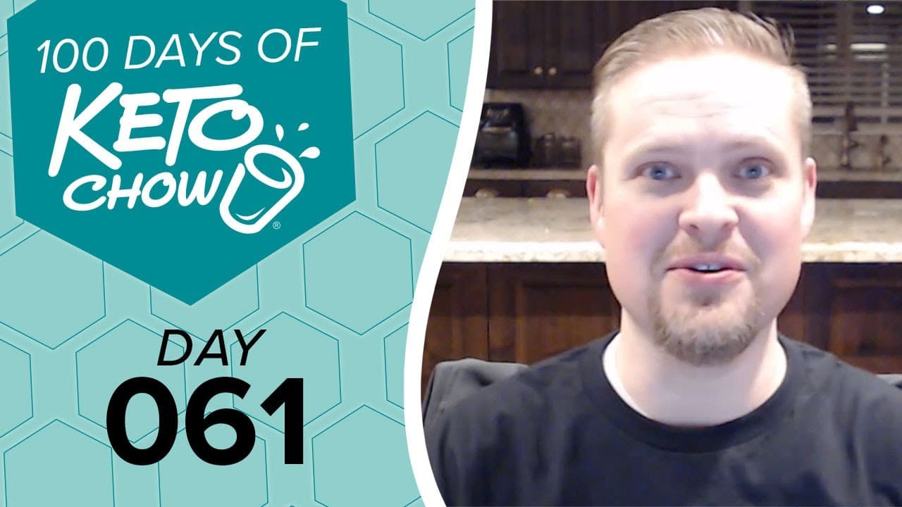 Keto Chow graphic on teal hexagonal background, displaying 100 DAYS OF KETO CHOW, a white cup logo, and DAY 061. A man is visible on the right.
