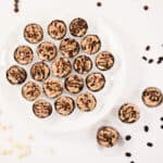 A white plate filled with Mini Mocha Mousse cups.ini
