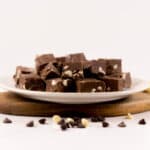 Close up - White plate filled with Irish Cream Double Chocolate Fudge squares.