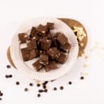 White plate filled with Irish Cream Double Chocolate Fudge squares.
